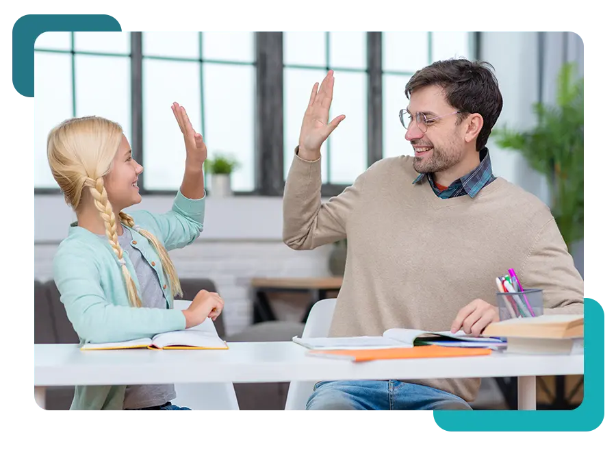 Teacher encouraging a student who is disengaged in class with supportive guidance and attention